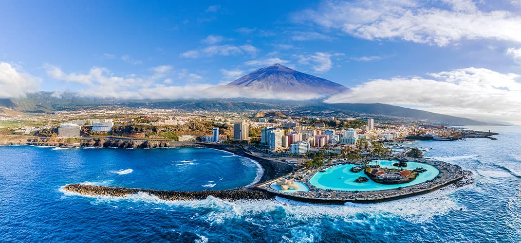 Aerial view of Puerto de la Cruz and Teide Volcano, Tenerife, Canary Islands